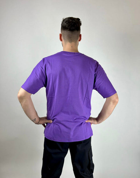 T-shirt DISCLAIMER scratch con strappi capo in tinto viola